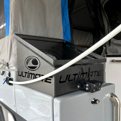 Rear bumper storage tray for two jerry cans