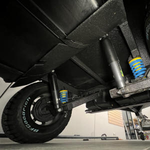 12 inch drum brakes, coil springs and standard track suspension
