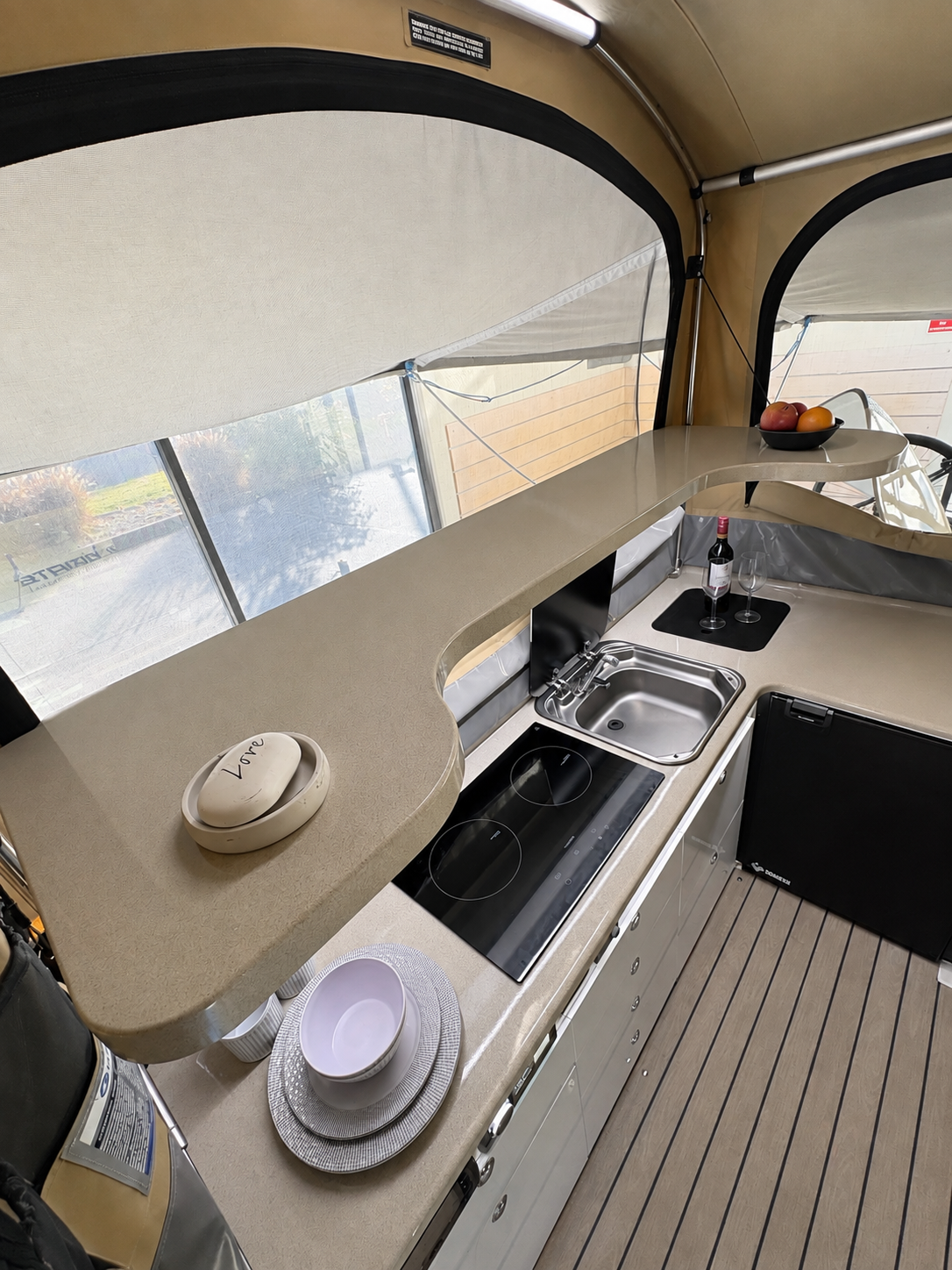 Galley shelf and kitchen overview with dimmable yellow and white light