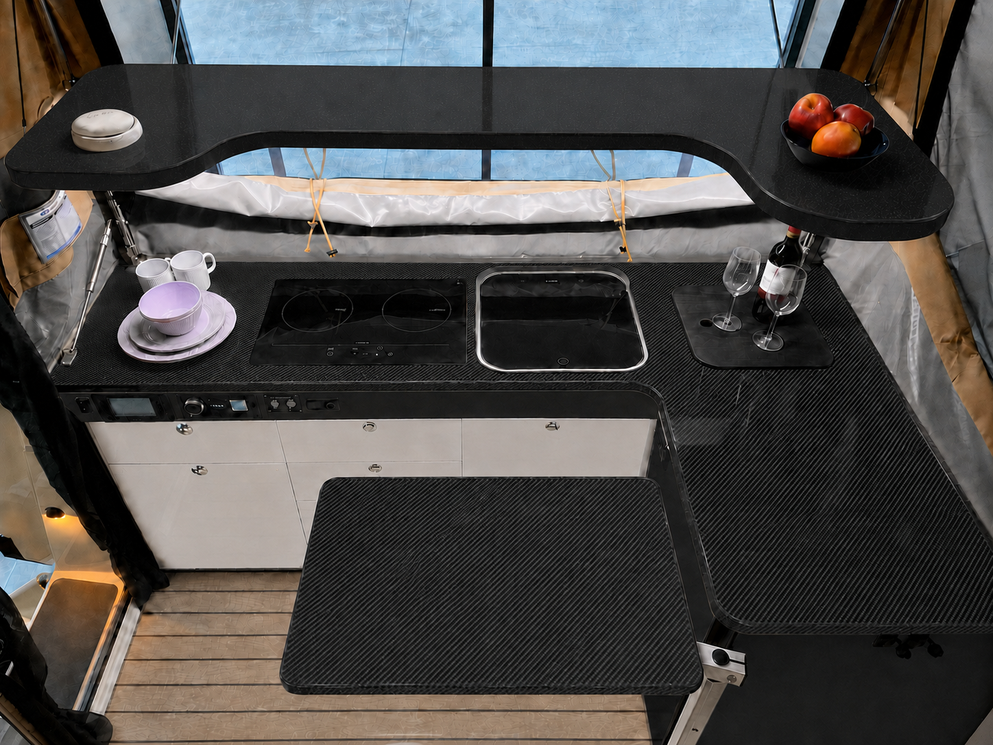 Carbon bench, table and galley shelf with charcoal fascia