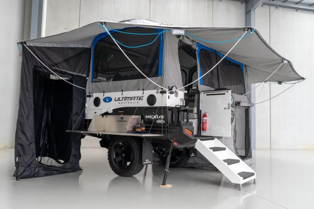 Ultimate Nexus camper fully opened to show its premium canvas walls, windows and surrounding awnings